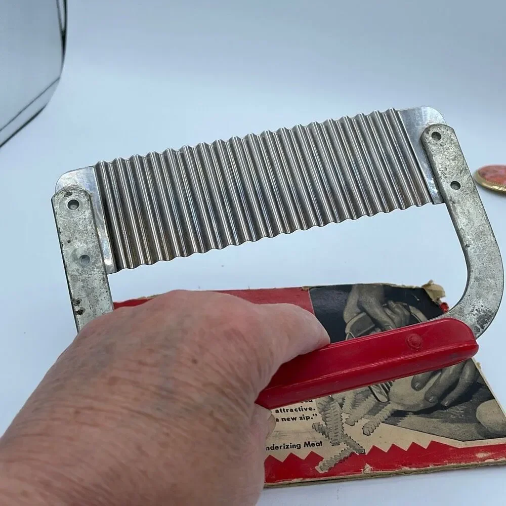 Vintage Huot Serrater and meat tenderizer in original packaging.